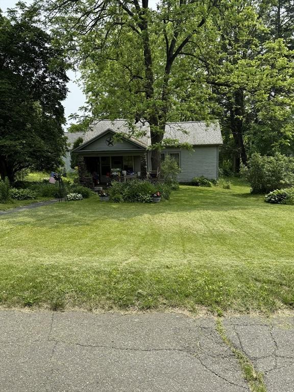 36 Railroad St, Amherst, MA 01002 - view of grassy yard featuring covered porch