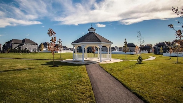 view of home's community with a gazebo and a lawn