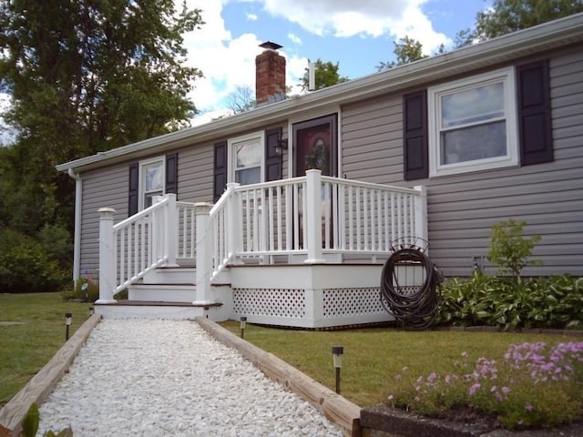 625 Middleboro Ave, Taunton, MA 02718 - single story home with a chimney and a front lawn