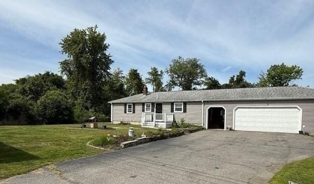 625 Middleboro Ave, Taunton, MA 02718 - single story home with an attached garage, driveway, a front lawn, and a chimney