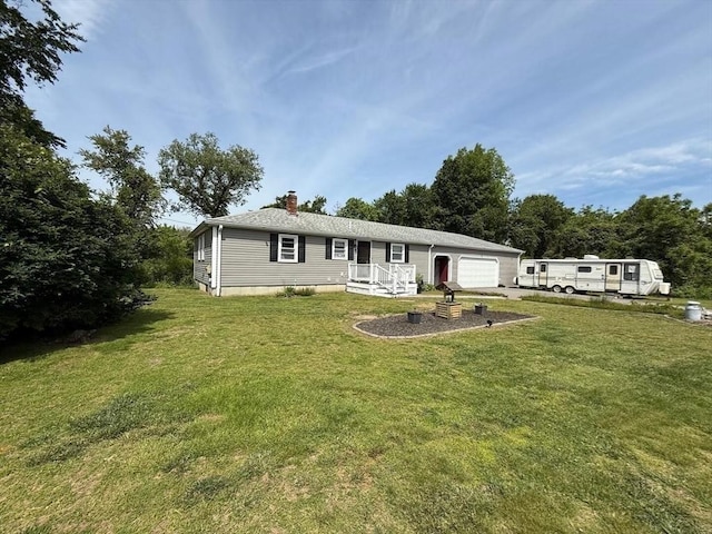 625 Middleboro Ave, Taunton, MA 02718 - view of front of home with a chimney, a front yard, and a garage