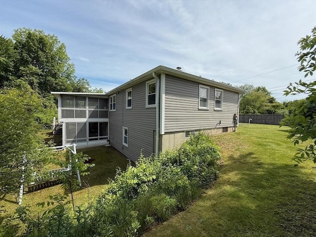625 Middleboro Ave, Taunton, MA 02718 - view of home's exterior with a sunroom