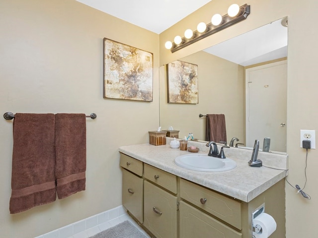 bathroom featuring tile floors and large vanity