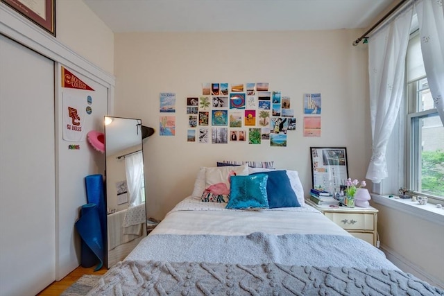 60 Dwight Unit 2, Brookline, MA 02446 - bedroom featuring wood finished floors