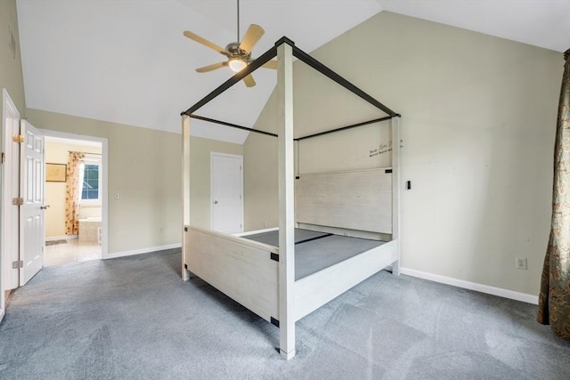 unfurnished bedroom featuring vaulted ceiling, carpet flooring, baseboards, ceiling fan, and a closet