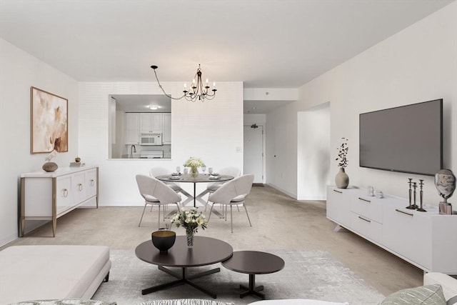 519 Harrison Ave Unit D117, Boston, MA 02118 - living area featuring a chandelier and light carpet
