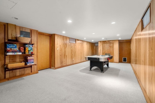 playroom featuring light carpet, recessed lighting, pool table, and wood walls