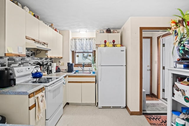 kitchen with backsplash, white cabinetry, white appliances, and sink