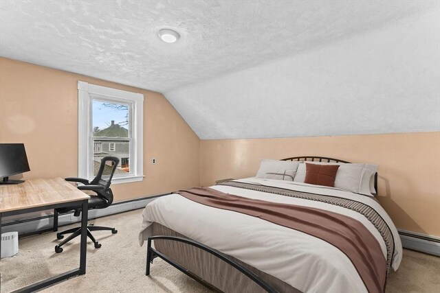 carpeted bedroom featuring a baseboard radiator, lofted ceiling, and a textured ceiling