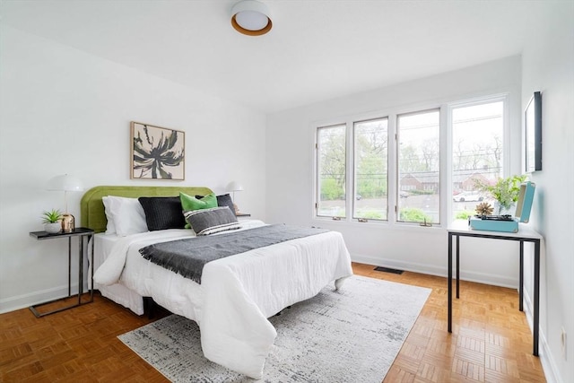 bedroom with baseboards
