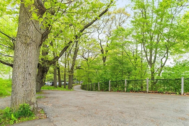 surrounding community featuring fence