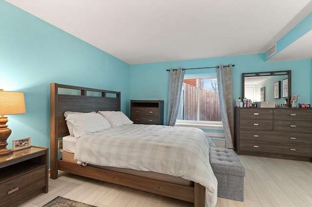 bedroom featuring light hardwood / wood-style flooring