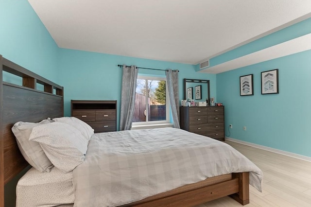 bedroom featuring light hardwood / wood-style floors