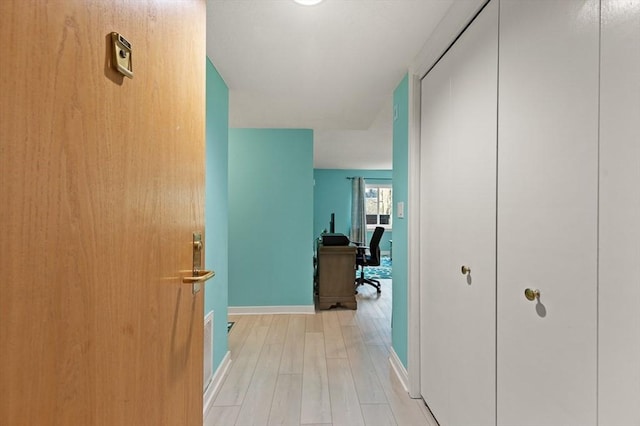 hallway featuring light hardwood / wood-style floors