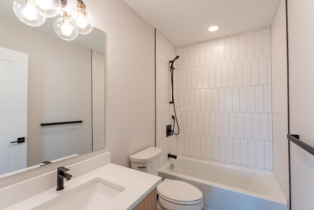 full bathroom with tiled shower / bath combo, vanity, toilet, and a chandelier