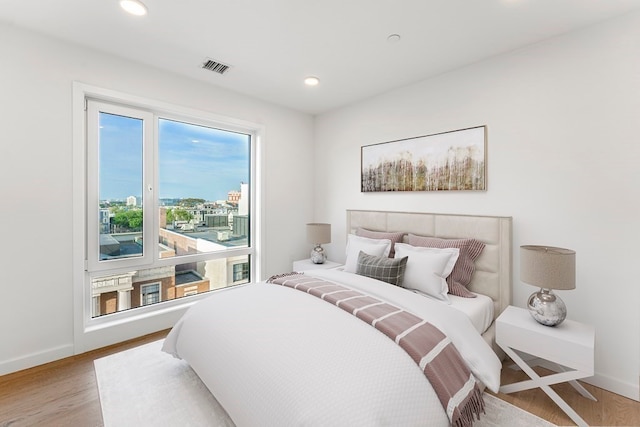 bedroom featuring light wood-type flooring