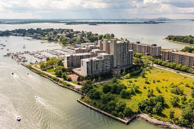 birds eye view of property featuring a water view