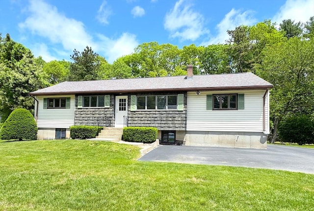6 Oak St, Foxboro, MA 02035 - view of front of home featuring a chimney, a front lawn, and view of scattered trees