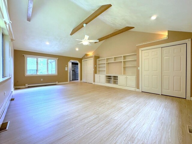 6 Oak St, Foxboro, MA 02035 - unfurnished living room with a baseboard radiator, arched walkways, light wood-style floors, lofted ceiling, and a baseboard heating unit