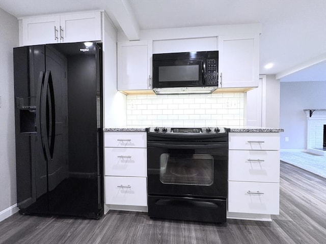 6 Oak St, Foxboro, MA 02035 - kitchen with black appliances, dark wood finished floors, white cabinets, tasteful backsplash, and light stone countertops