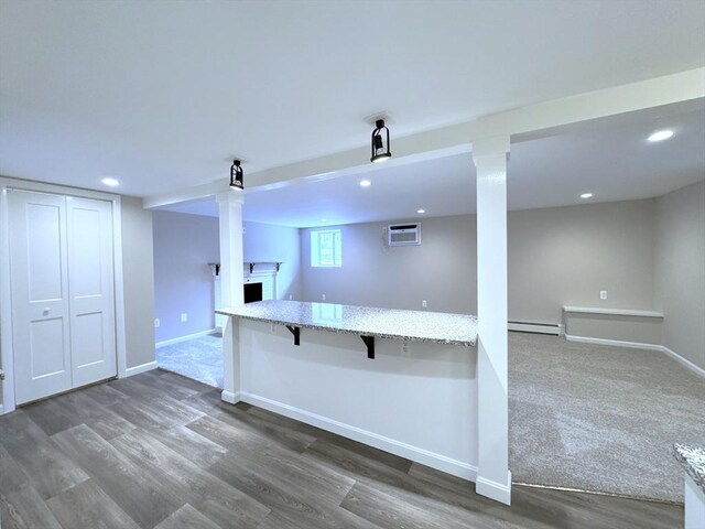 6 Oak St, Foxboro, MA 02035 - bar area featuring baseboard heating, a wall mounted AC, baseboards, recessed lighting, and wood finished floors