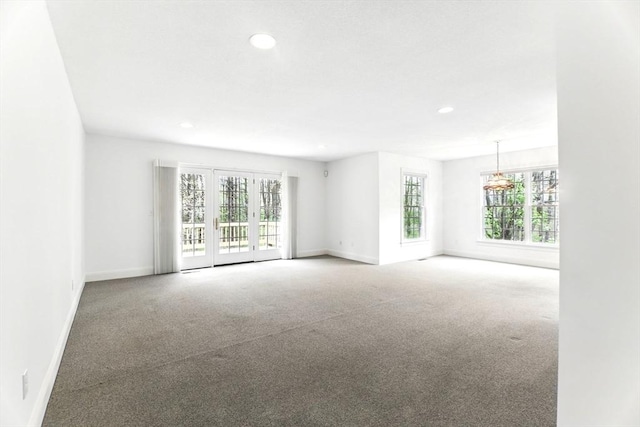 102 Pinehurst Dr Unit 102, East Longmeadow, MA 01028 - carpeted spare room with an inviting chandelier, baseboards, and recessed lighting