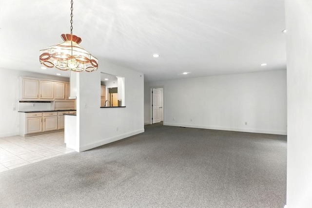 102 Pinehurst Dr Unit 102, East Longmeadow, MA 01028 - unfurnished living room featuring a chandelier, baseboards, and recessed lighting