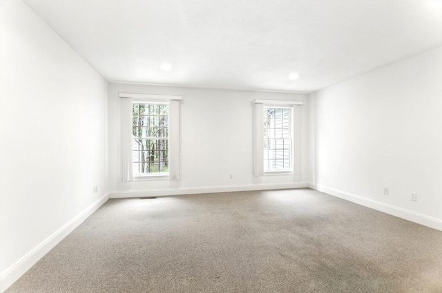 102 Pinehurst Dr Unit 102, East Longmeadow, MA 01028 - spare room with carpet, baseboards, visible vents, and recessed lighting