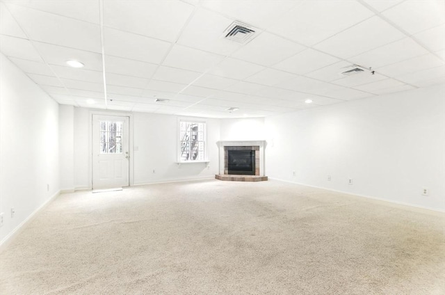 102 Pinehurst Dr Unit 102, East Longmeadow, MA 01028 - unfurnished living room with carpet, visible vents, a paneled ceiling, baseboards, and a tile fireplace