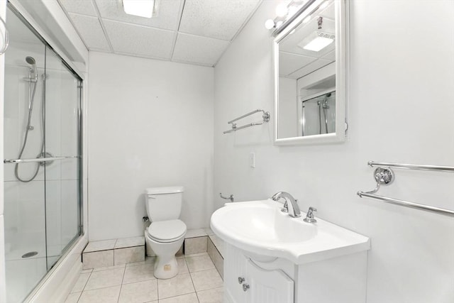 102 Pinehurst Dr Unit 102, East Longmeadow, MA 01028 - full bath with toilet, vanity, a shower with door, tile patterned flooring, and a paneled ceiling