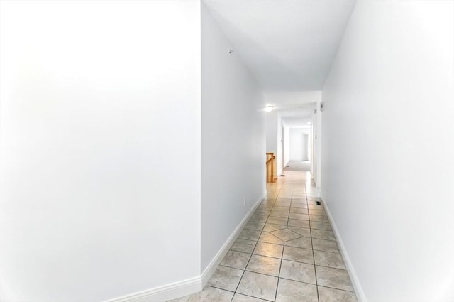 102 Pinehurst Dr Unit 102, East Longmeadow, MA 01028 - corridor featuring baseboards and light tile patterned floors