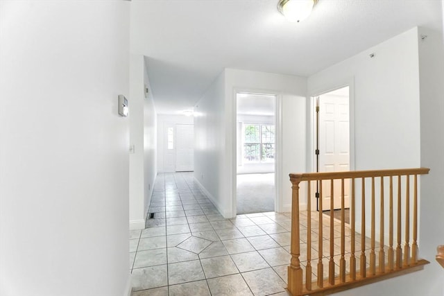 102 Pinehurst Dr Unit 102, East Longmeadow, MA 01028 - hallway featuring light tile patterned flooring and baseboards