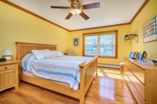 bedroom with light wood-style floors, ornamental molding, a ceiling fan, and a baseboard heating unit