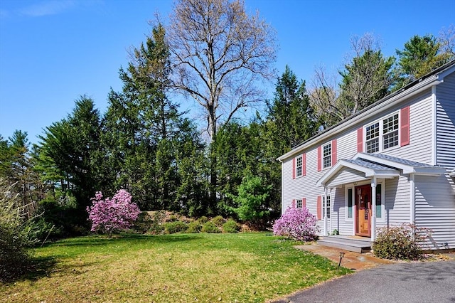 exterior space with a lawn