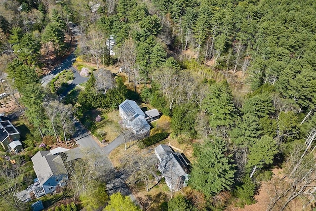 drone / aerial view featuring a view of trees