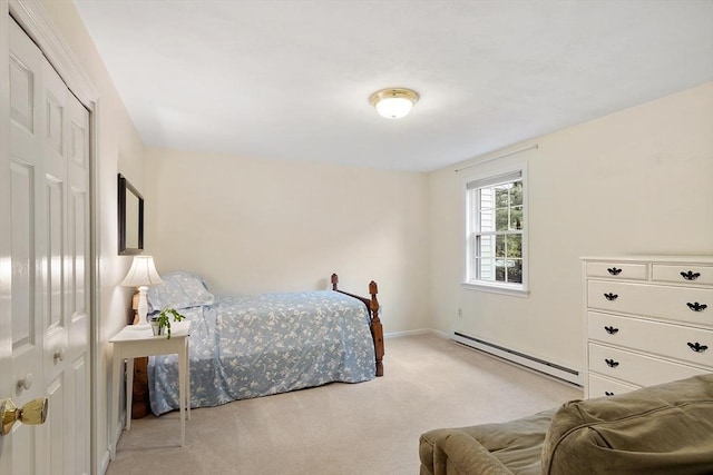 carpeted bedroom with baseboards and baseboard heating