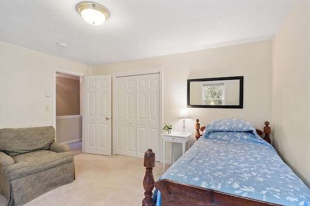 carpeted bedroom with a closet