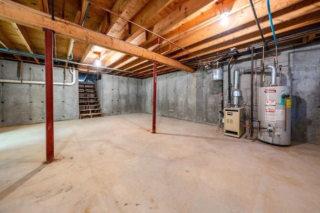 unfinished below grade area with water heater, a heating unit, and stairs