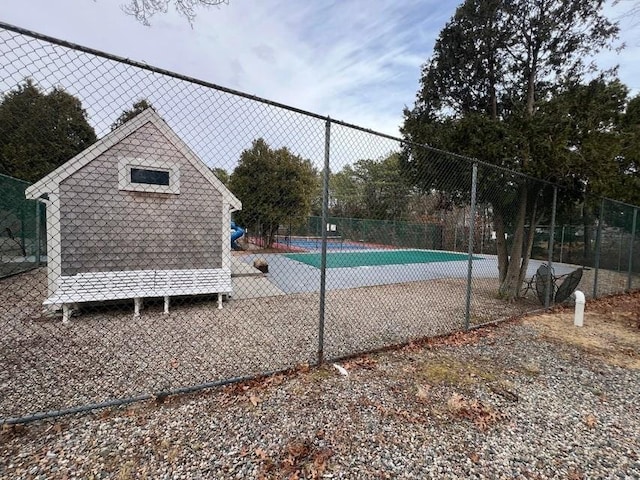 community pool featuring fence