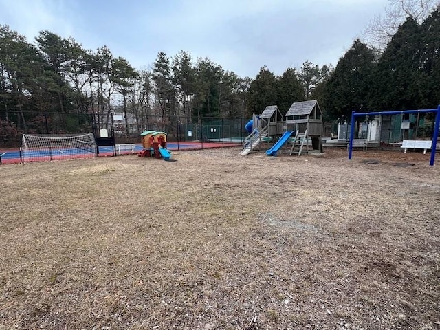 community jungle gym with fence