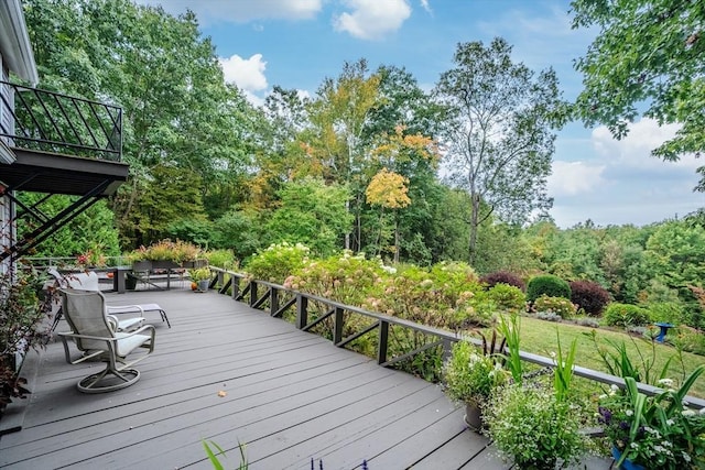 deck with a wooded view