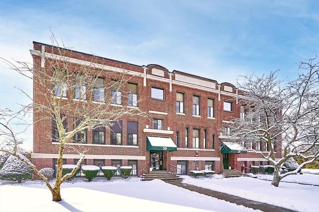 view of snow covered property