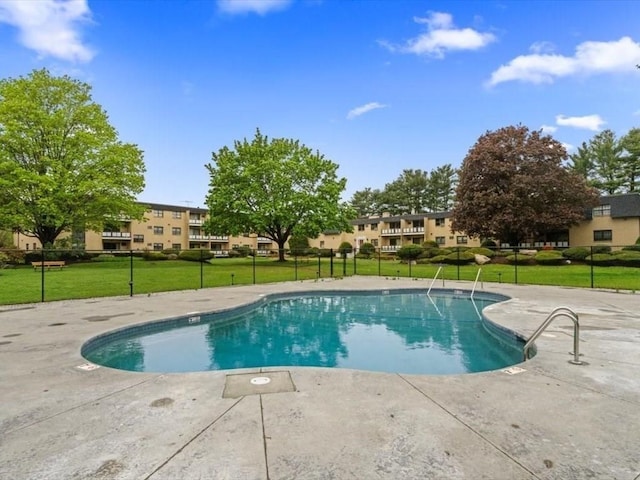 community pool with a patio