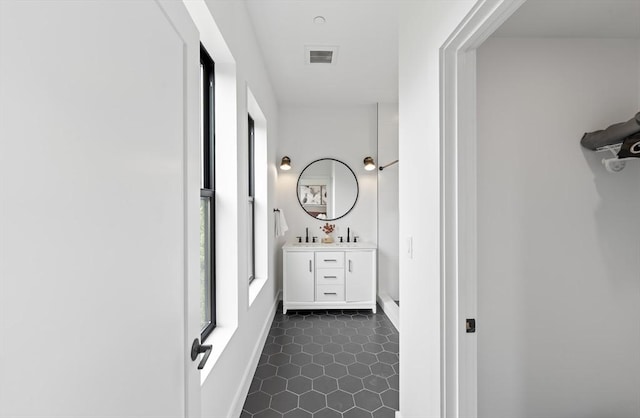 7 Wordsworth Unit Ph6, Boston, MA 02128 - hall featuring dark tile patterned floors and baseboards