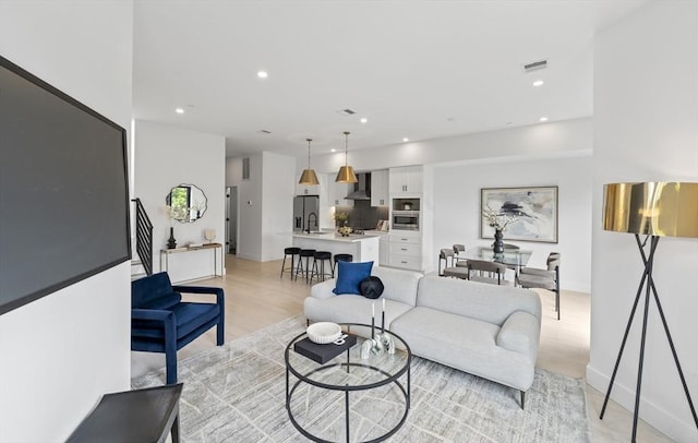 7 Wordsworth Unit Ph6, Boston, MA 02128 - living room with light wood-style flooring, recessed lighting, and baseboards
