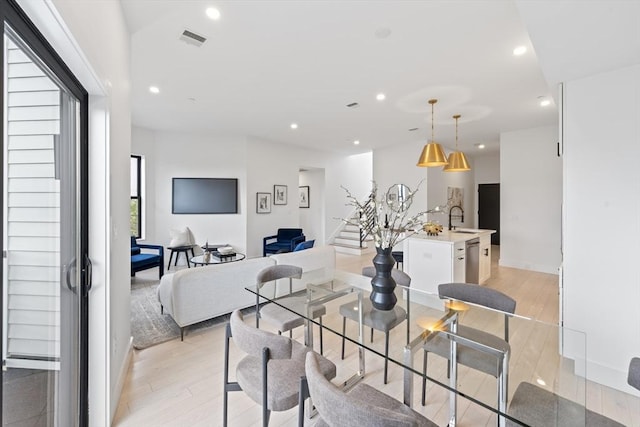 7 Wordsworth Unit Ph6, Boston, MA 02128 - dining area with recessed lighting, light wood-type flooring, baseboards, and stairway