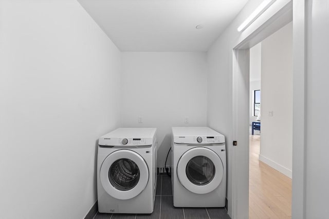 7 Wordsworth Unit Ph6, Boston, MA 02128 - laundry room with washing machine and dryer and baseboards