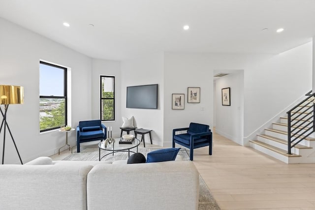7 Wordsworth Unit Ph6, Boston, MA 02128 - living area featuring light wood finished floors, recessed lighting, stairs, and baseboards