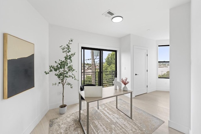 7 Wordsworth Unit Ph6, Boston, MA 02128 - home office featuring light wood-type flooring and baseboards