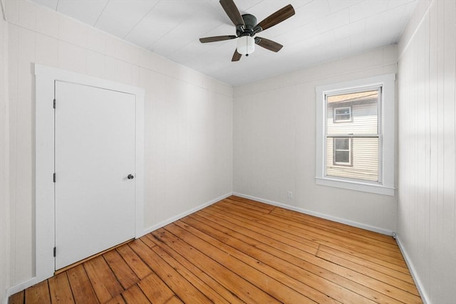 unfurnished room featuring ceiling fan and light hardwood / wood-style floors